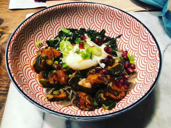 January 06, 2022 #soba noodles with miso-sesame dressing and kabocha squash, kale, pomegranate, and poached egg #vegetarian