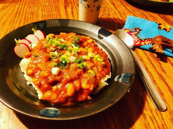 January 10, 2022 cajun sausage beans and red gravy over cheesy grits #vegetarian